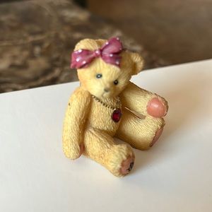 Enesco Bear figurine, wearing January’s birthstone necklace, 1”x1”